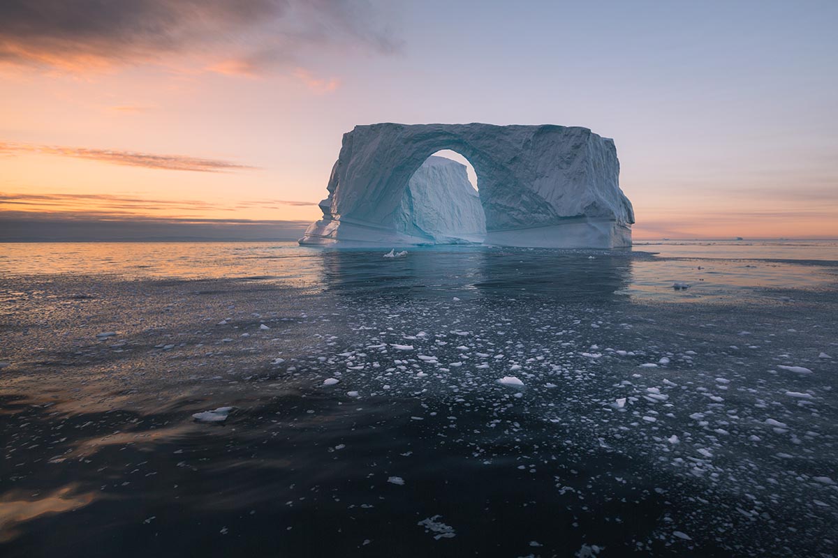 An iceberg floating in the sea off the east coast of Greenland