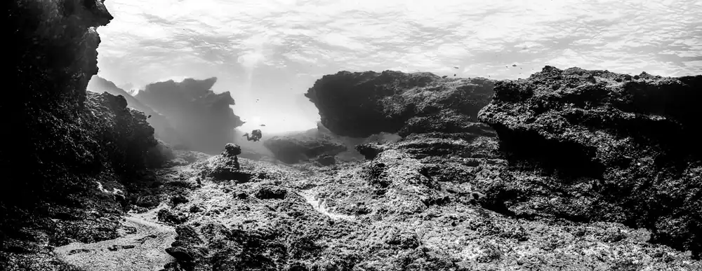 Underwater panorama of the rock formations at Pedras Secas, Fernando de Noronha