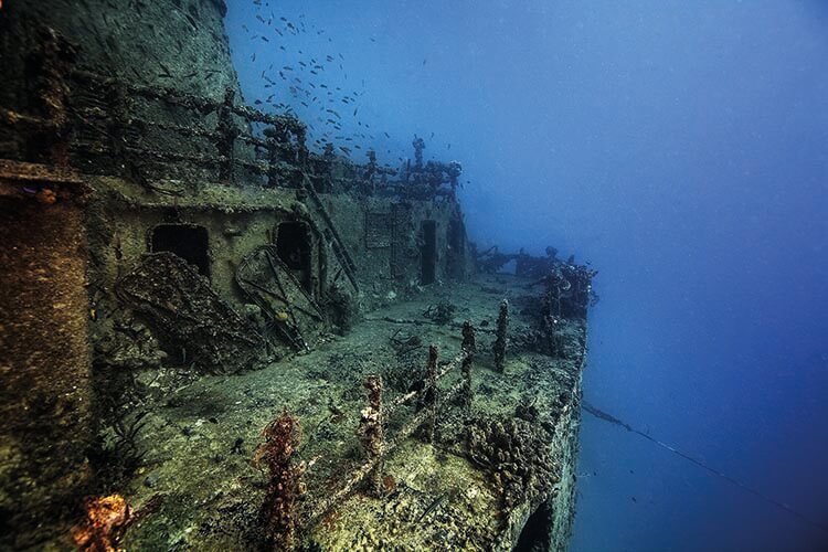 a view along the railing of the eagle shipwreck in the florida keys