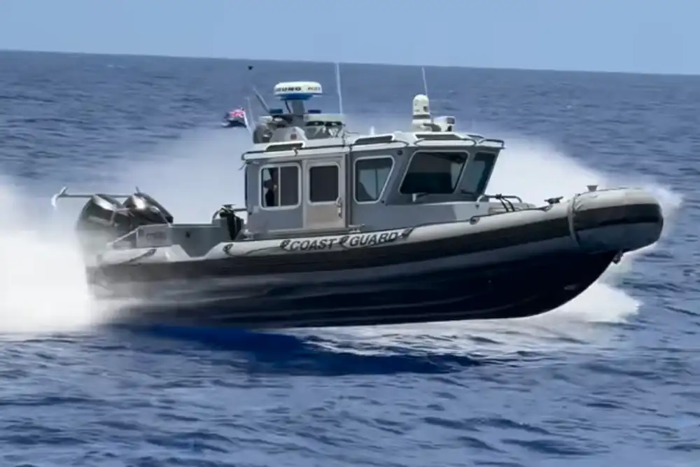 Cayman Islands divers surface to find boat capsized