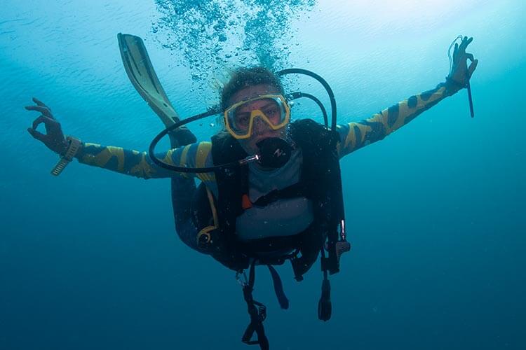 Reefscape travel's India Tyndall pictured while scuba diving