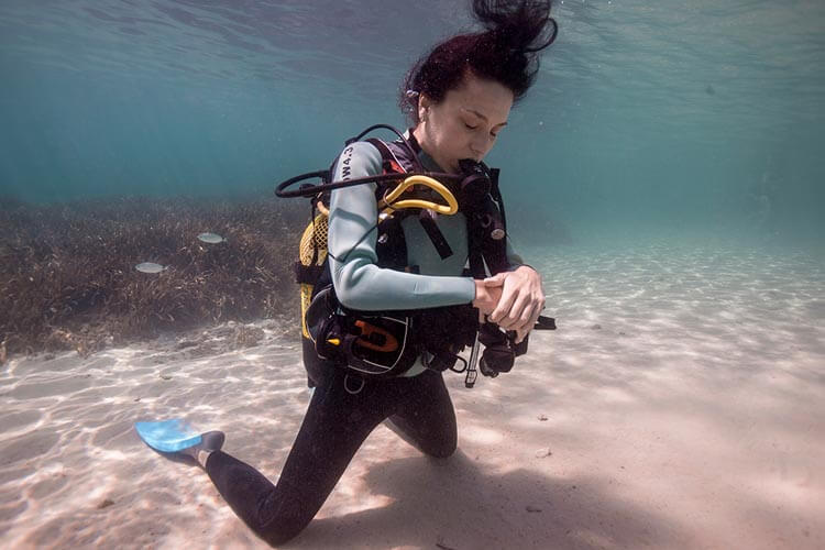 a diver practising breathing underwater without a mask