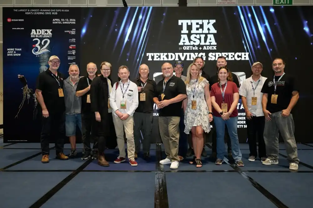 Group photograph on the TEKAsia stage at ADEX Singapore in 2026