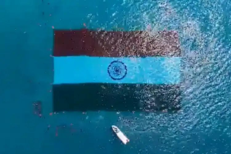 the 60mx40m indian flag unfurled underwater by scuba divers